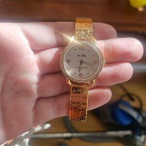 Rose gold like jew coach watch